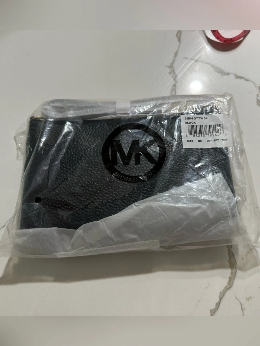 MICHAEL Michael Kors Black Pebbled Leather Coin Wristlet with Gold Plaque new
